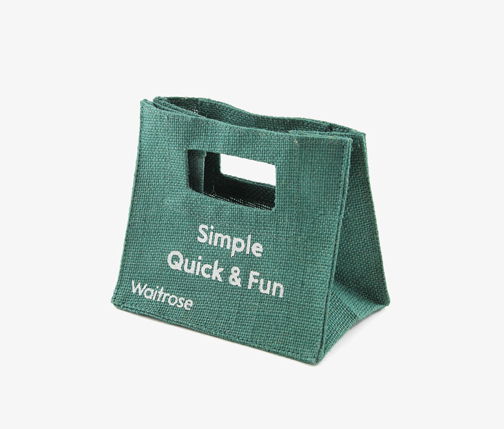 Small green jute bag with die cut handles